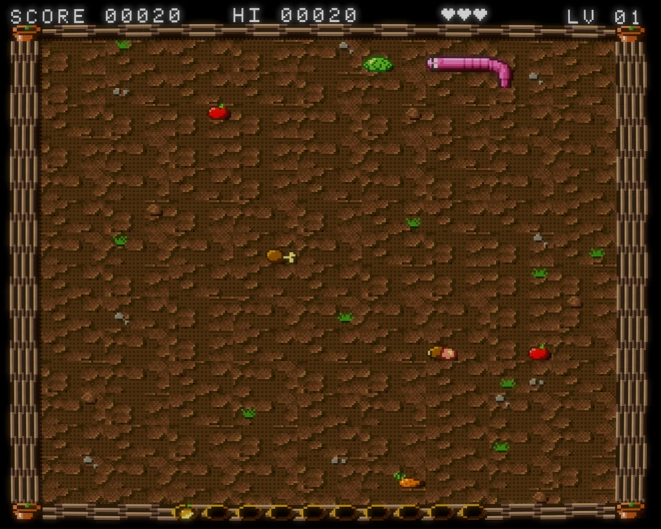 Wyrm: The Witch’s Orchard on the Amiga by day: Willy, a pink earthworm, turns towards a lettuce on a muddy garden scattered with apples, a carrot, a drumstick and a ham, with the score, hearts and level along the top