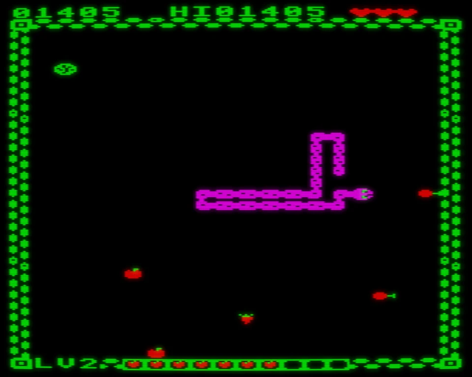 Wyrm: The Witch’s Orchard on the BBC Micro by day: Willy, a long pink earthworm, winds across a black garden inside a green fence, with two apples, a carrot, a cabbage and two drumsticks around him, the score, high score and hearts along the top, and seven apples on the curse meter along the bottom